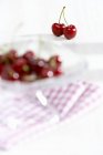 Cherries in glass bowl — Stock Photo