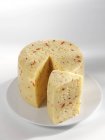 Tilsiter cheese with pepper — Stock Photo