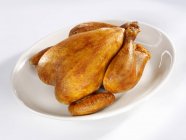 Whole roasted chicken — Stock Photo