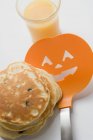 Pancakes for Halloween with spatula — Stock Photo