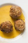 Three meatballs on plate — Stock Photo