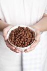 Bowl of chocolate flavoured puffed rice — Stock Photo