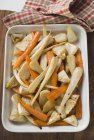 Roasted carrots with parsnips and celeriac — Stock Photo