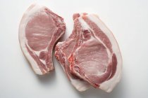 Côtelettes de porc crues — Photo de stock