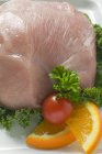 Fresh pork with vegetable garnish — Stock Photo