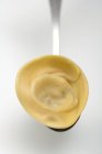 Tortellino pasta on spoon — Stock Photo