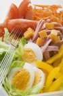 Mixed salad with ham and egg — Stock Photo