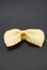 Farfalle pasta piece — Stock Photo