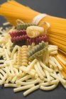 Bundle of spaghetti and various pasta — Stock Photo