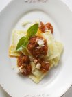 Ravioli pasta with mince and sauce — Stock Photo