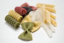 Various types of coloured pasta — Stock Photo