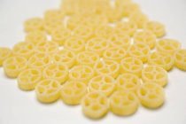 Dried wagon wheel pasta pieces — Stock Photo