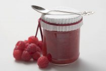 Jar of raspberry jam — Stock Photo