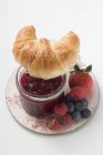 Berry jam and croissant — Stock Photo