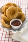 Squid rings in paper dish — Stock Photo