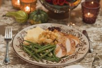 Elevated view of turkey breast with accompaniments for Thanksgiving — Stock Photo