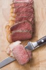 Beef steak with knife — Stock Photo