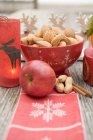 Christmas decoration with nuts and candle — Stock Photo