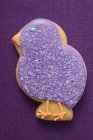 Biscuit in form of purple chick — Stock Photo