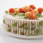 Birthday cake with marzipan roses — Stock Photo