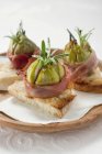 Figs wrapped in ham — Stock Photo