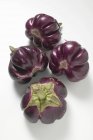 Fresh ripe round aubergines — Stock Photo