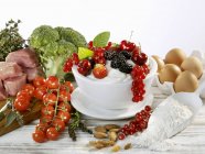 Berries, vegetables, meat — Stock Photo