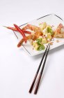 Fried shrimps with chilli and chopped potatoes — Stock Photo