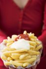 Fried chips with ketchup and mayonnaise — Stock Photo