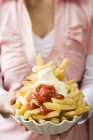 Fried chips with ketchup and mayonnaise — Stock Photo