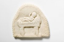 Springerle cookie with Baby Jesus impression — Stock Photo