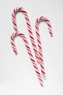 Candy canes on white — Stock Photo