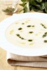 Potato cream soup with pesto — Stock Photo