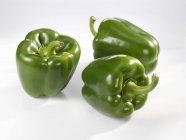 Three green peppers — Stock Photo