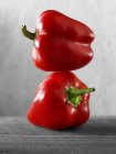 Two red bell peppers — Stock Photo