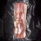 Rashers of raw bacon — Stock Photo