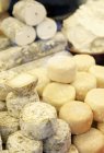 Assortment of raw milk cheeses — Stock Photo