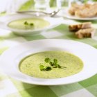 Cress soup with bread — Stock Photo