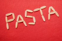 Palabra Pasta hecha de pasta seca - foto de stock