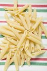 Dried penne pasta — Stock Photo