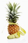 Pineapple with tape measure — Stock Photo