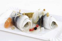 Rollmops on paper plate — Stock Photo