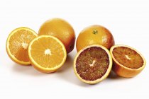 Halved fresh oranges — Stock Photo