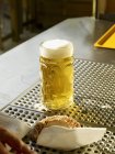 Draught beer on bar — Stock Photo