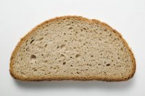 Rebanada de pan de sésamo - foto de stock