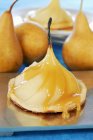 Closeup view of pears with maple syrup — Stock Photo