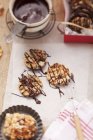 Elevated view of Florentines decorated with chocolate icing — Stock Photo