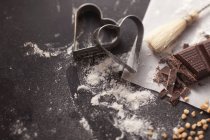 Closeup view of cutters and baking ingredients — Stock Photo