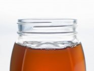 Відкрита баночка меду — стокове фото