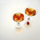 Martinis with cherries in glasses — Stock Photo